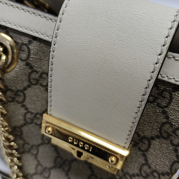 Padlock Small Monogram Coated Canvas Beige