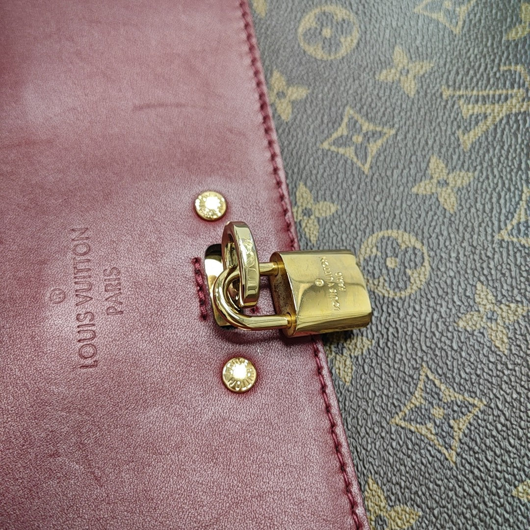 VÉNUS Monogram Coated Canvas Brown