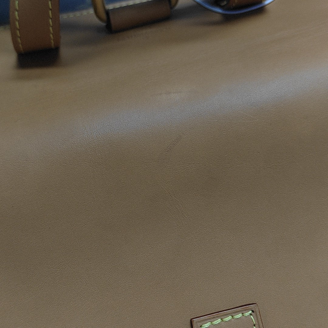 TRIO Monogram Coated Canvas Brown