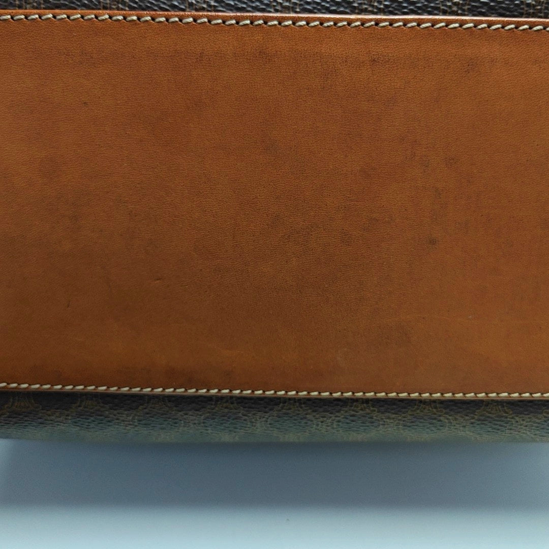 Authenticated pre-owned  MACADAM BLASON TRIOMPHE Coated Canvas Brown - Top Handle Bag at Looply