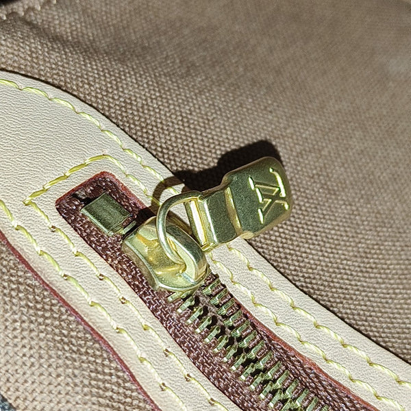 SPEEDY 25 Monogram Coated Canvas Brown