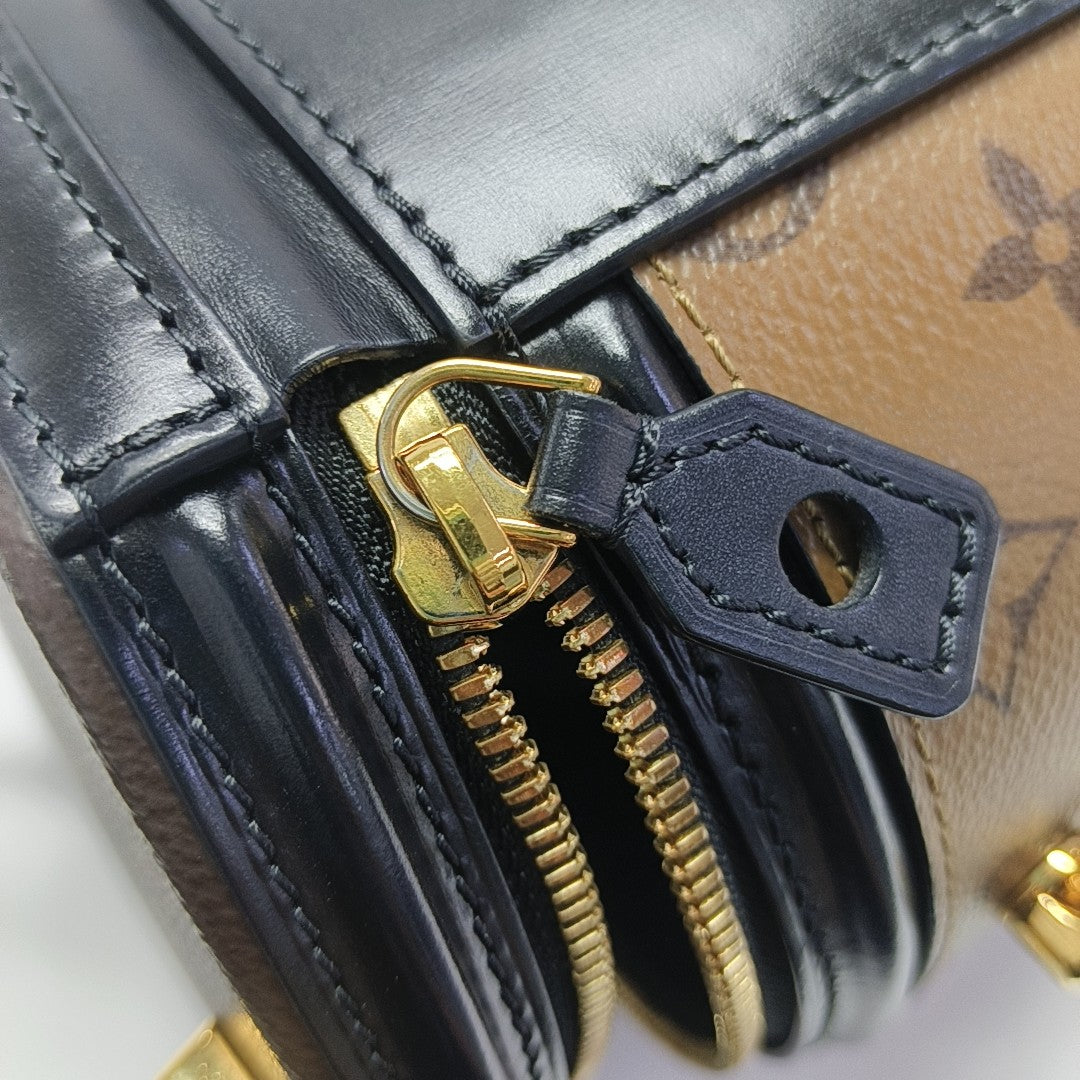 CANNES PM Monogram Coated Canvas Brown