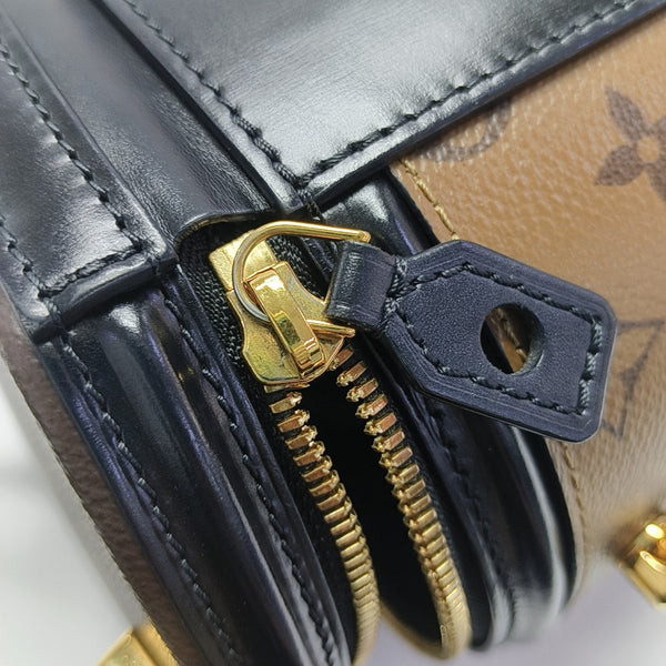 CANNES PM Monogram Coated Canvas Brown