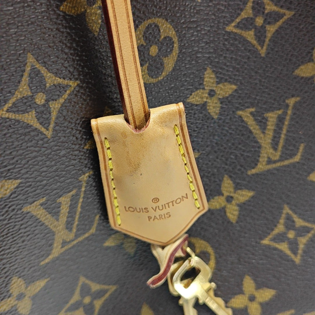 MONTAIGNE Monogram Coated Canvas Brown
