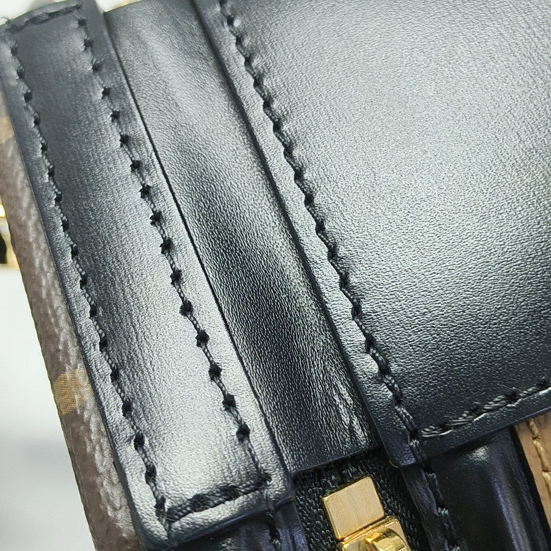 CANNES PM Monogram Coated Canvas Brown