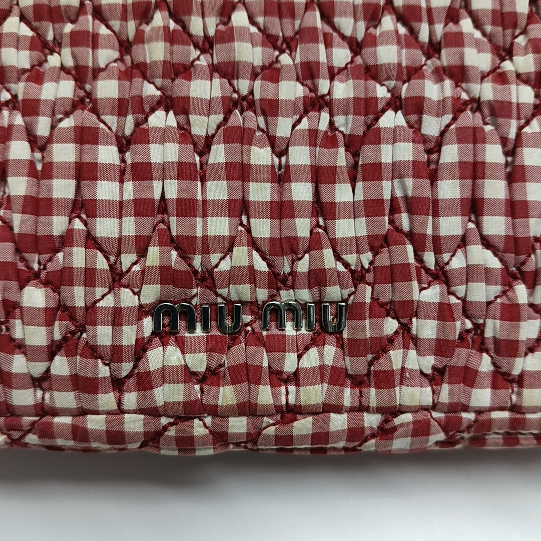 Bolso bandolera de tela acolchada rojo