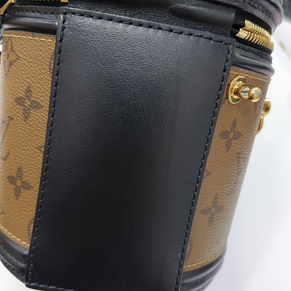CANNES PM Monogram Coated Canvas Brown
