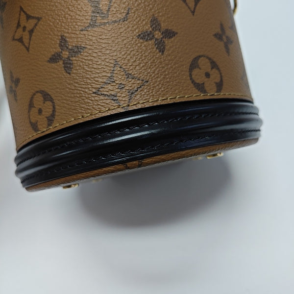 CANNES PM Monogram Coated Canvas Brown