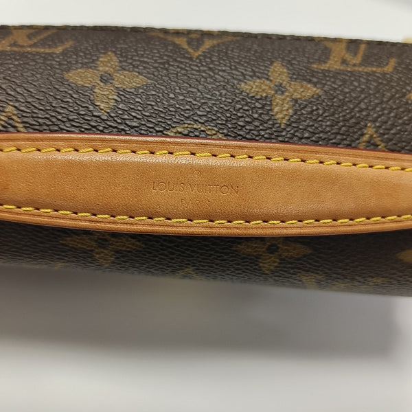 MÉTIS EAST WEST Monogram Coated Canvas Brown