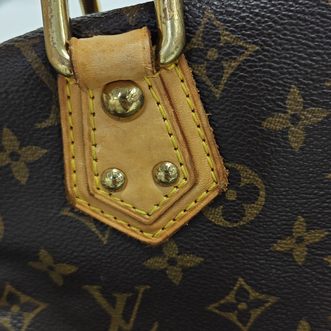 MANHATTAN PM Monogram Coated Canvas Brown