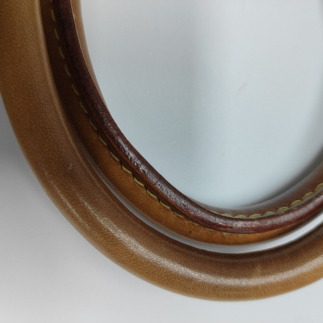 ALMA PM Monogram Coated Canvas Brown
