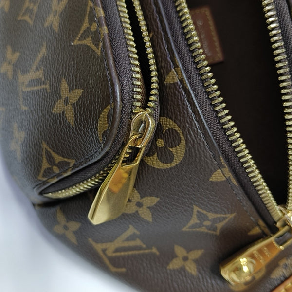 RUSH Monogram Coated Canvas Brown