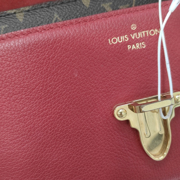 VICTOIRE Monogram Coated Canvas Brown