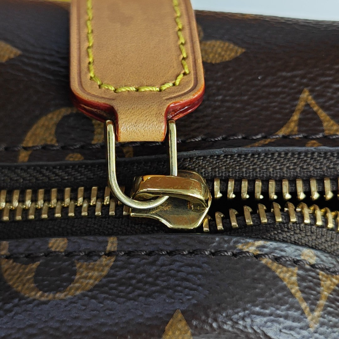 SIDE TRUNK PM Monogram Coated Canvas Brown