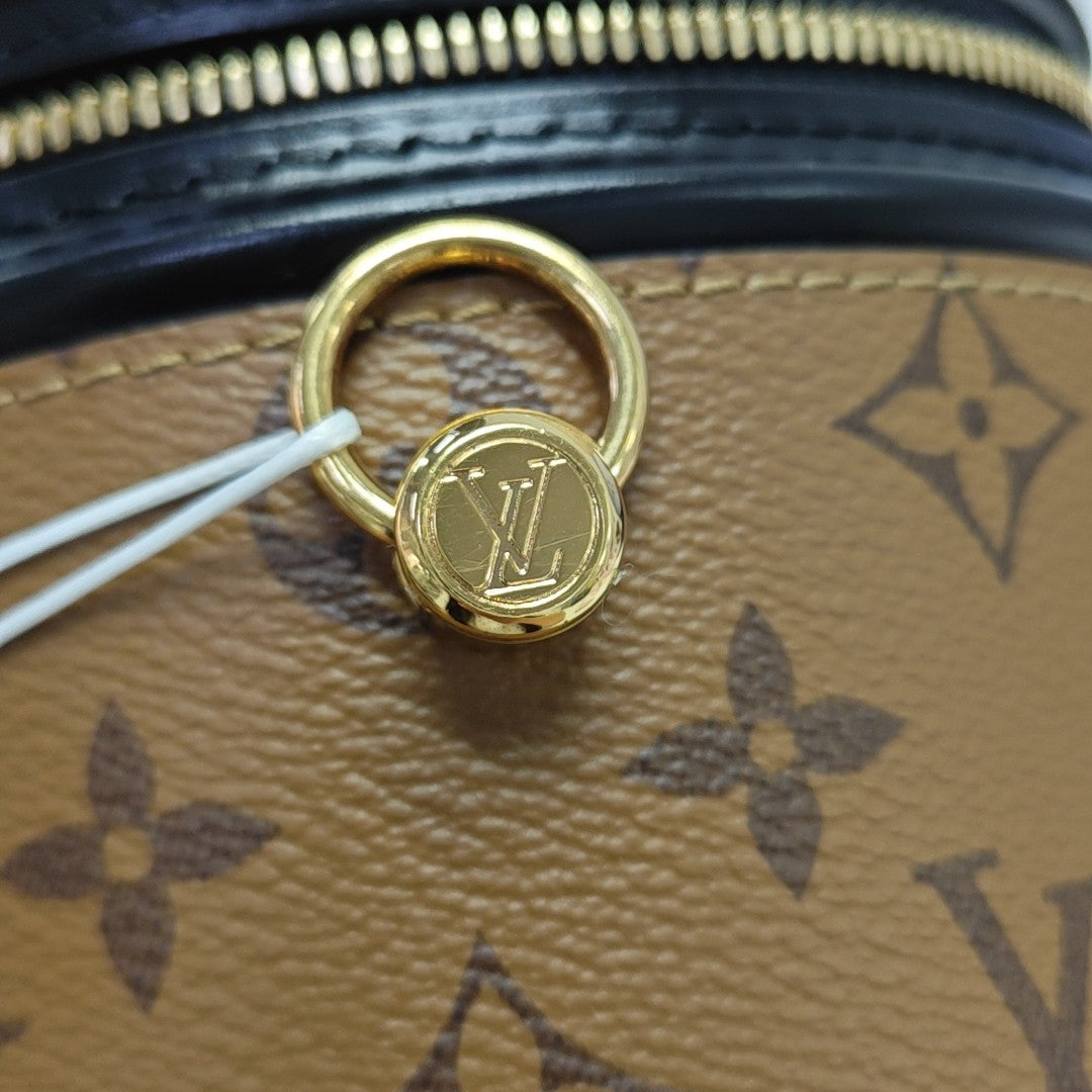 CANNES PM Monogram Coated Canvas Brown
