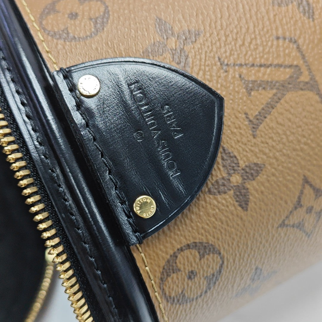 CANNES PM Monogram Coated Canvas Brown