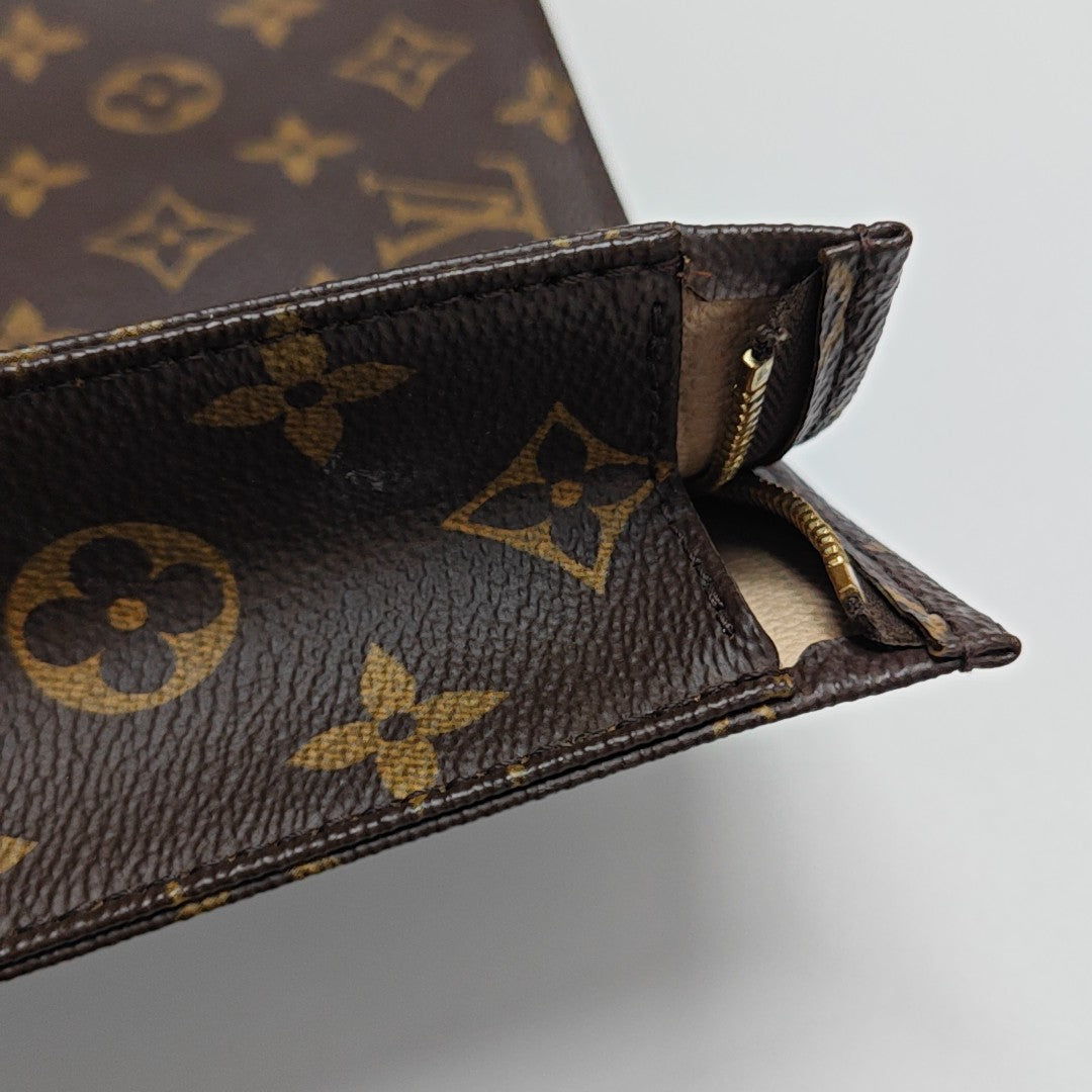 TOILET POCKET 26 Monogram Coated Canvas Brown