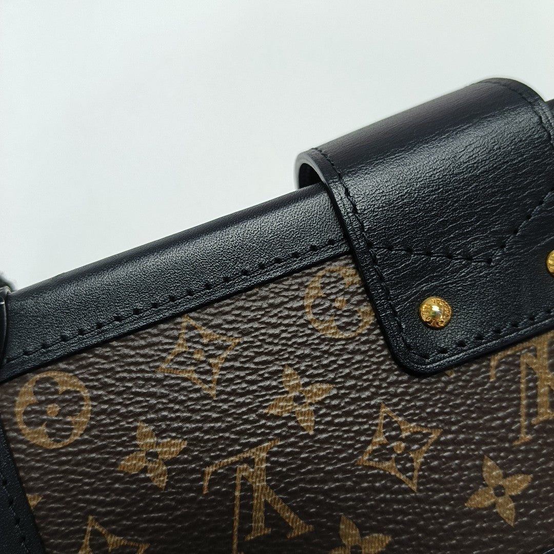 PETITE MALLE Monogram Coated Canvas Brown