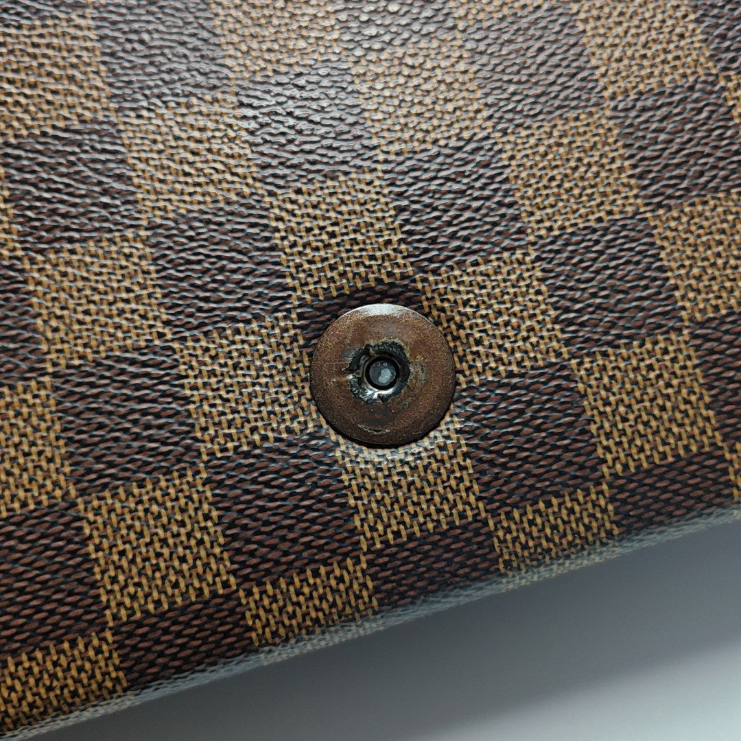 TRIBECA Damier Ebene Coated Canvas Brown