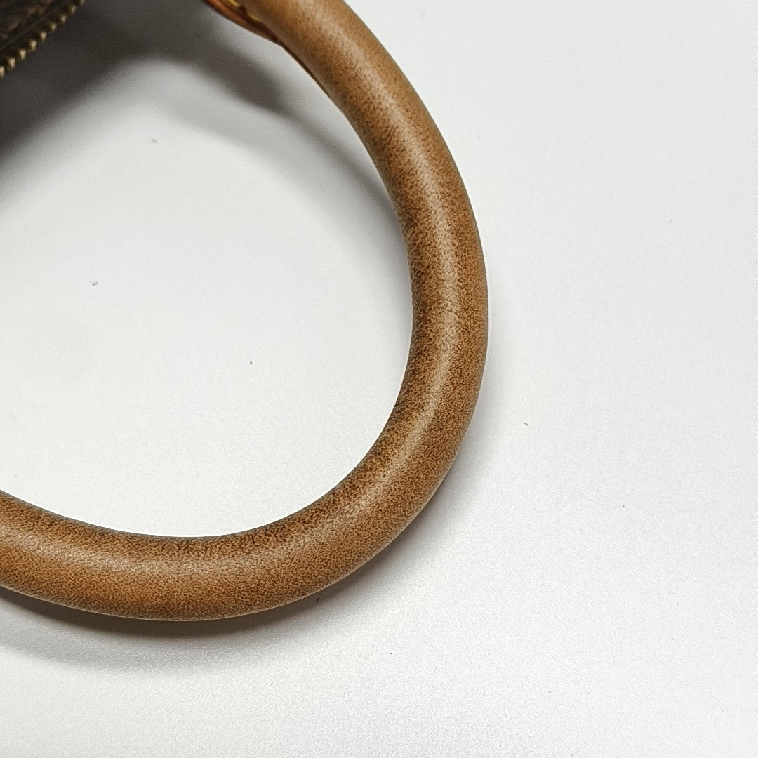 SPEEDY 25 Monogram Coated Canvas Brown