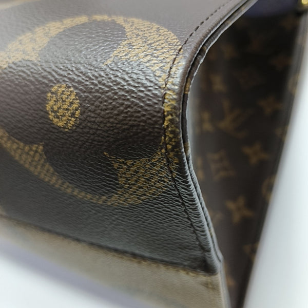 ONTHEGO MM Monogram Coated Canvas Brown