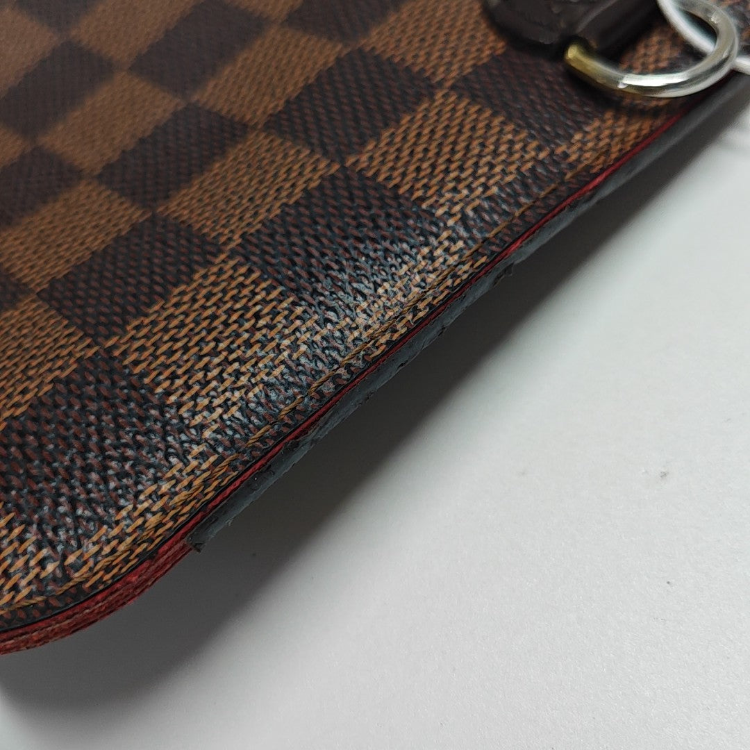 Damier Ebene Coated Canvas Clutch Brown