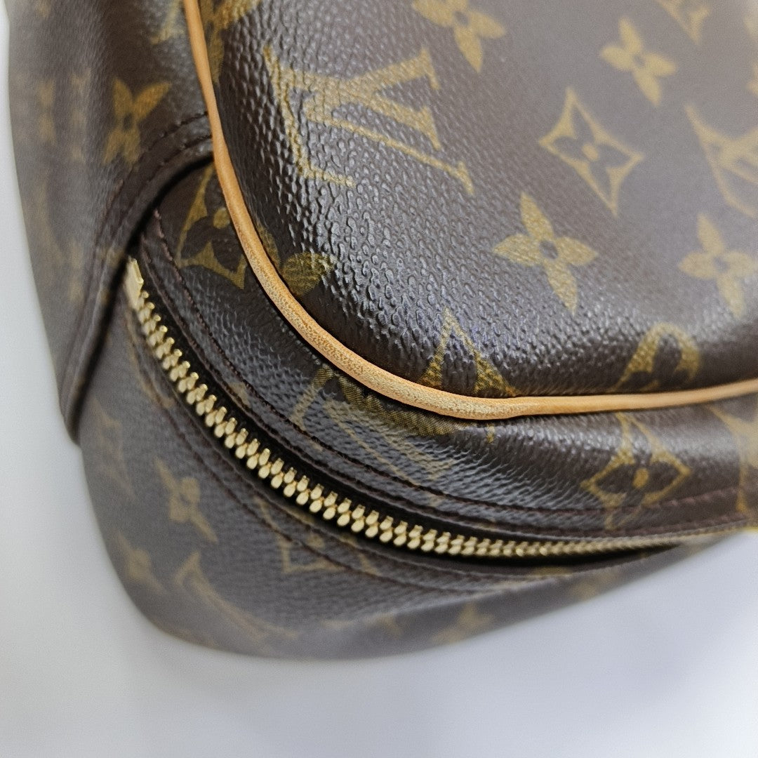 EXCURSION Monogram Coated Canvas Brown