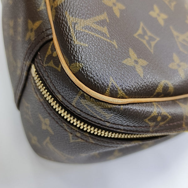 EXCURSION Monogram Coated Canvas Brown