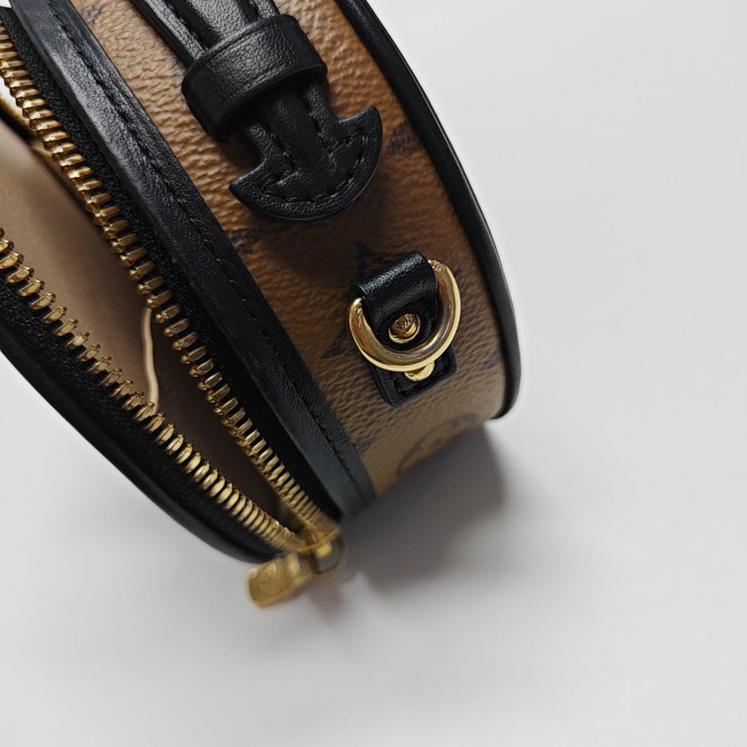BOITE CHAPEAU Mini Monogram Coated Canvas Brown