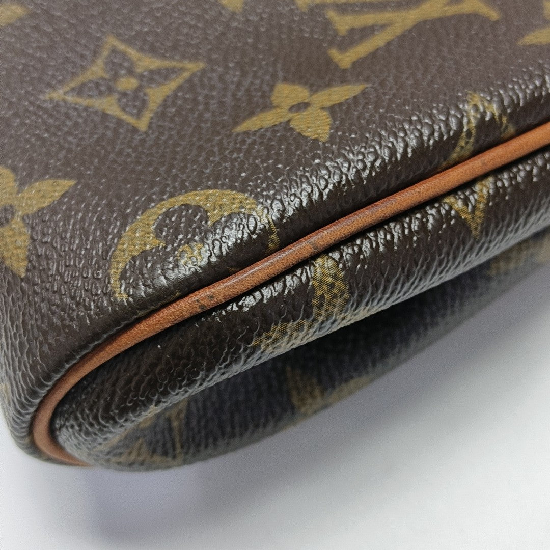 EVA Monogram Coated Canvas Brown