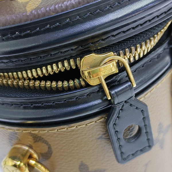 CANNES PM Monogram Coated Canvas Brown