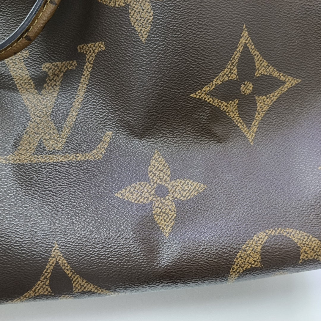 ONTHEGO GM Monogram Coated Canvas Brown
