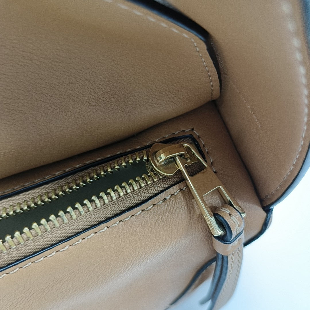 Authenticated pre-owned  Puzzle Hobo Calfskin Brown - Top Handle Bag at Looply