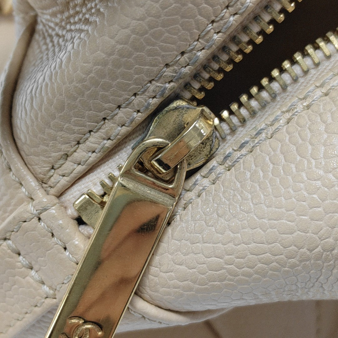 CHANEL PETITE Quilted Grained Calfskin Beige