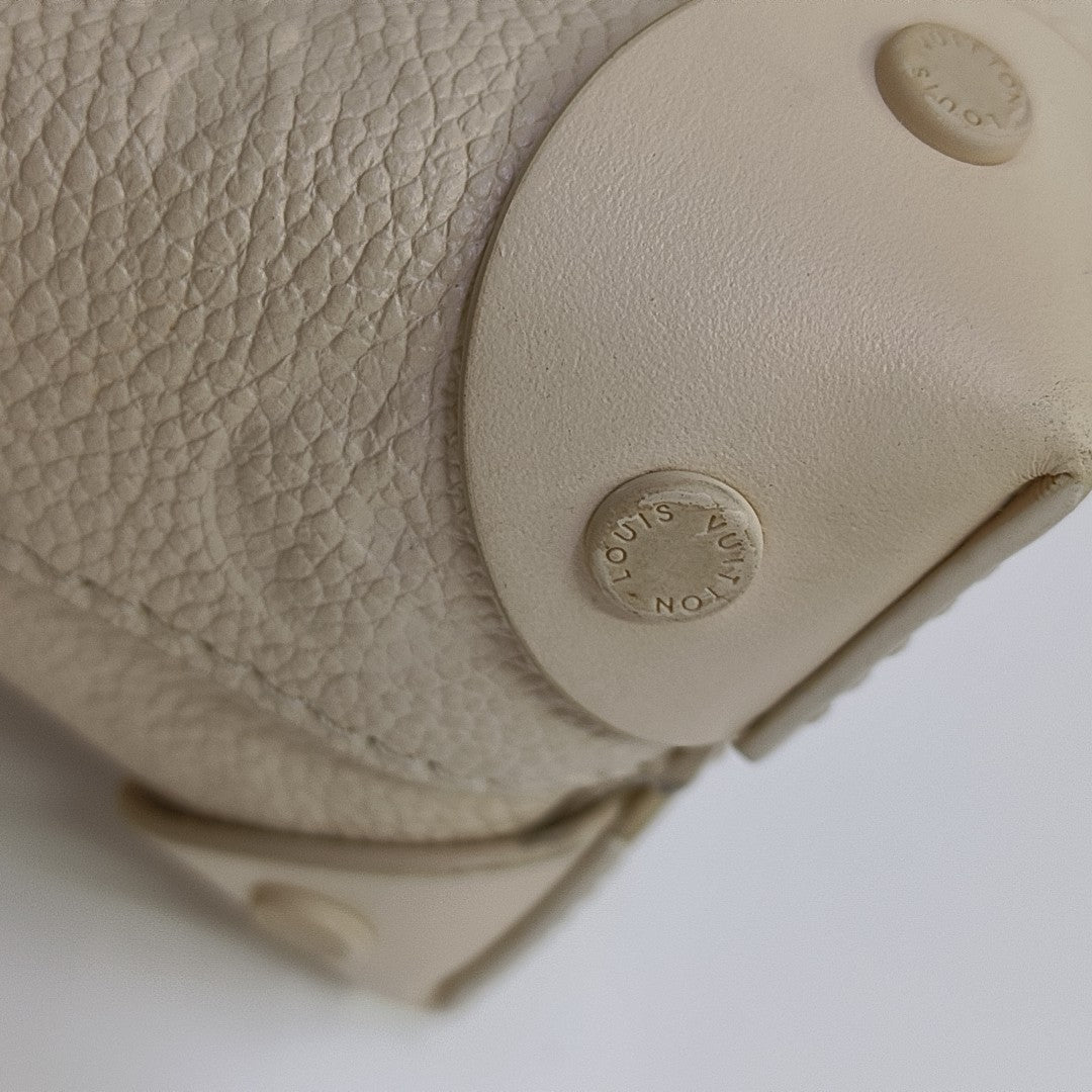 PETITE MALLE Monogram Calfskin Beige