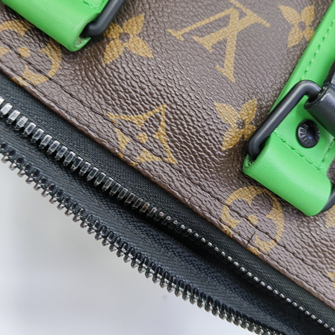 KEEPALL 25 Monogram Coated Canvas Brown