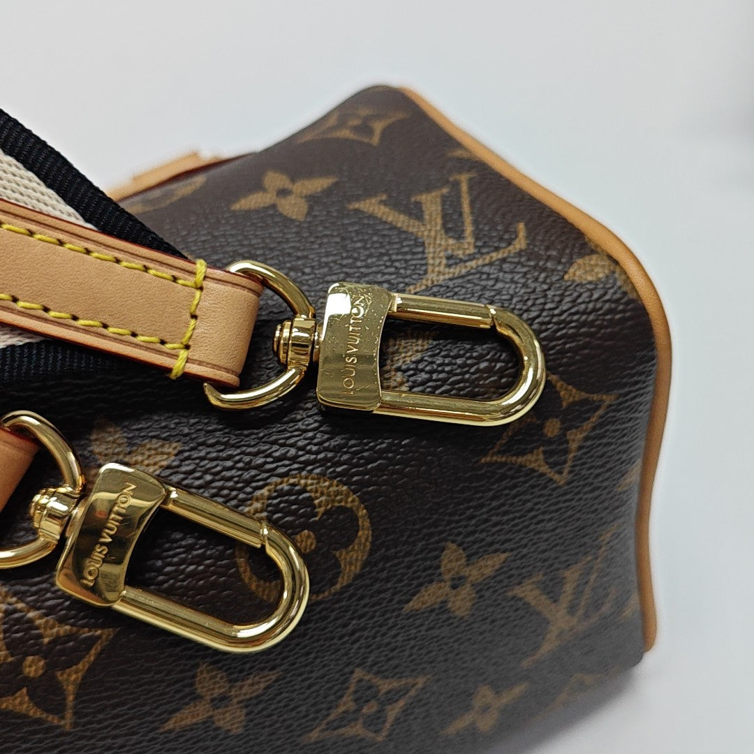 SPEEDY 20 Monogram Coated Canvas Brown