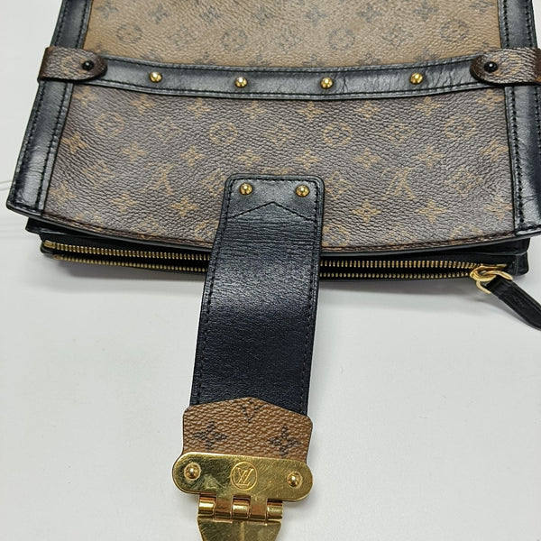 TRUNK Monogram Coated Canvas Brown