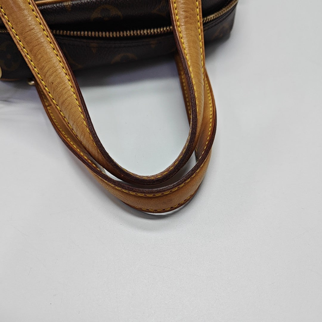 EXCENTRI-CITE Monogram Coated Canvas Brown