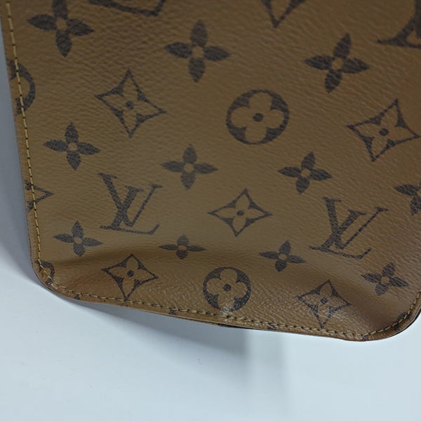 ONTHEGO MM Monogram Coated Canvas Brown