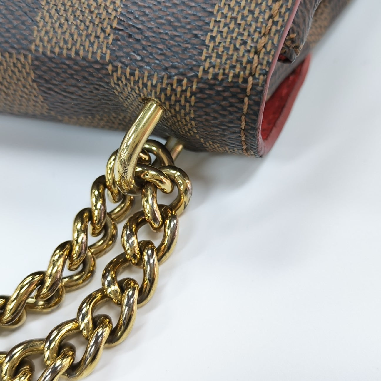 CAÏSSA Damier Ebene Coated Canvas Brown