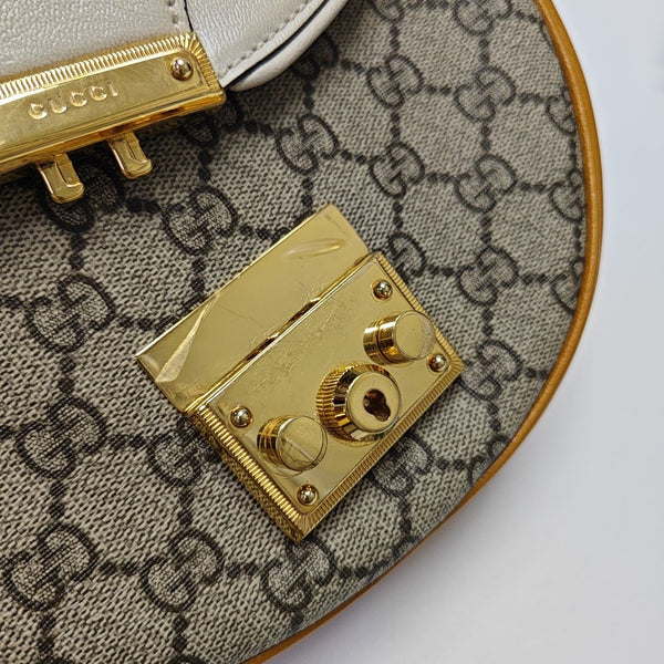Padlock Small Monogram Coated Canvas Beige