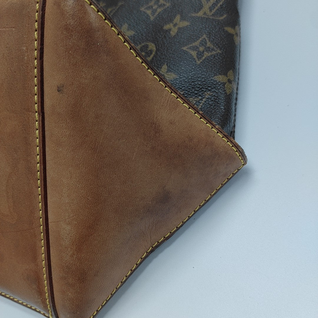 PIANO Monogram Coated Canvas Brown
