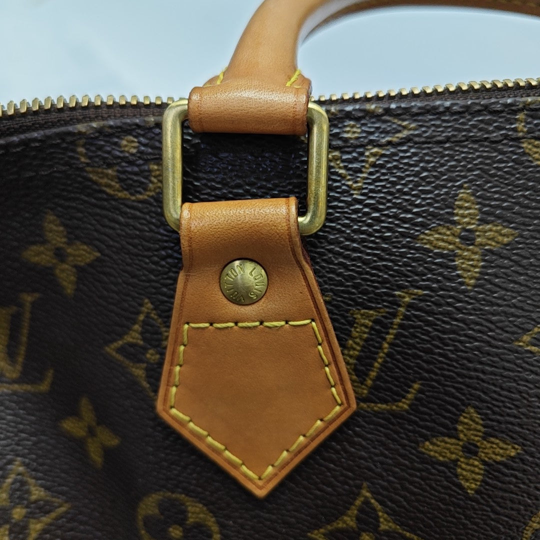 SPEEDY 35 Monogram Coated Canvas Brown