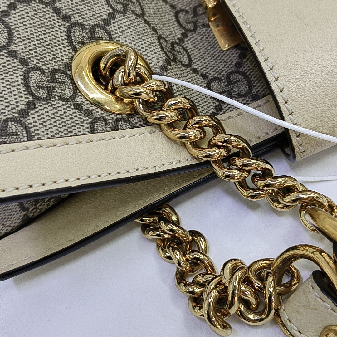 Padlock Small Monogram Coated Canvas Beige
