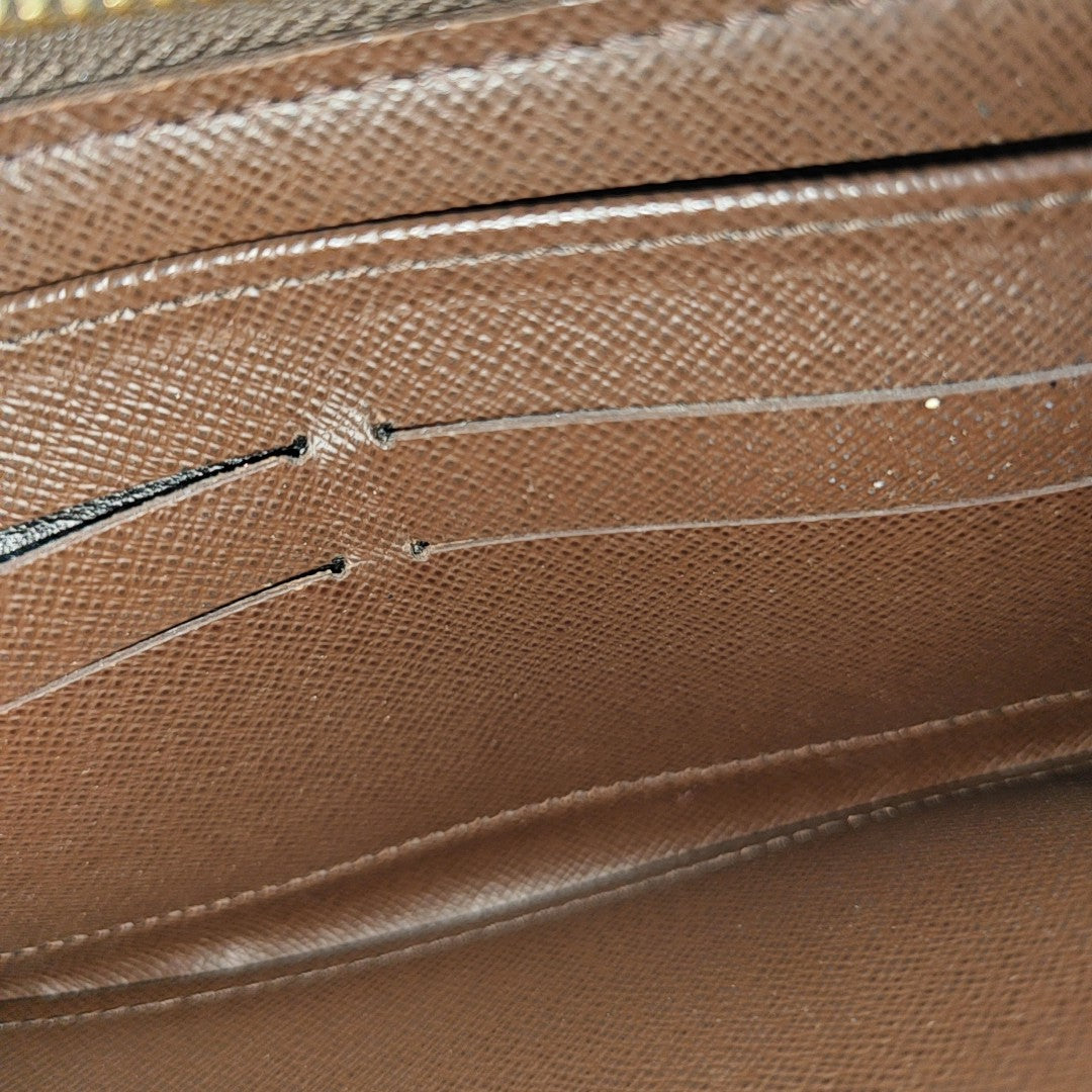 ZIPPY Damier Ebene Coated Canvas Brown Wallet