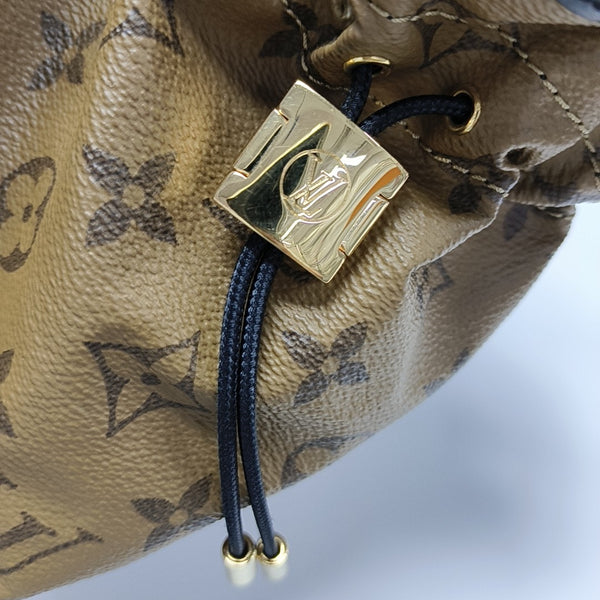 Petit Noe Monogram Coated Canvas Brown