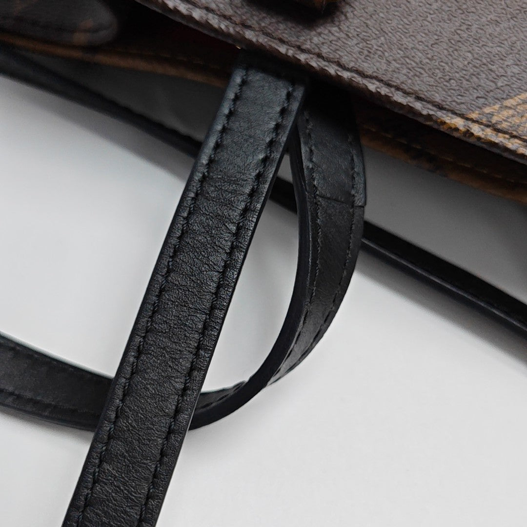 ONTHEGO MM Monogram Coated Canvas Brown