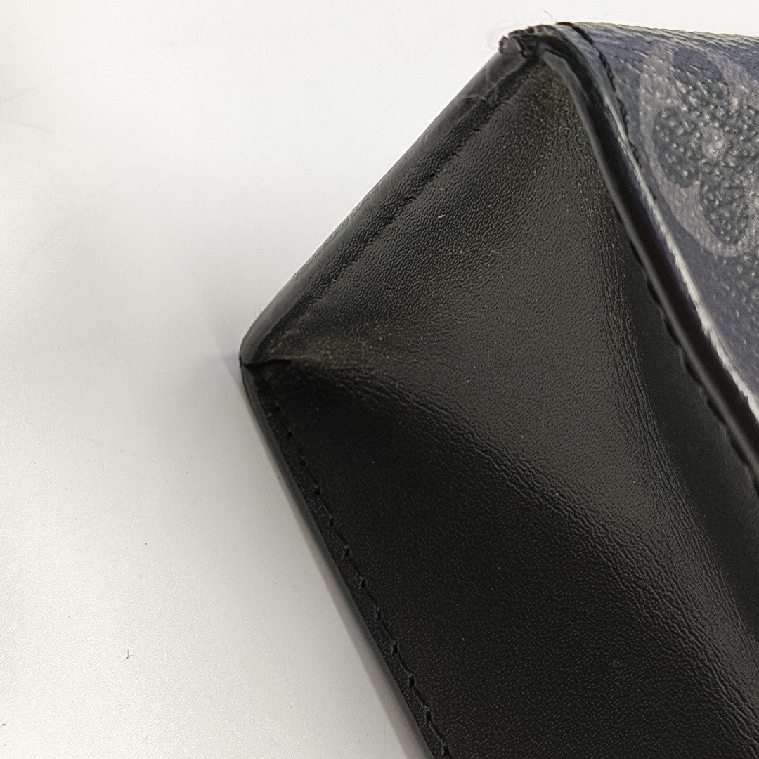 Pochette Voyag MM Monogram Coated Canvas Black