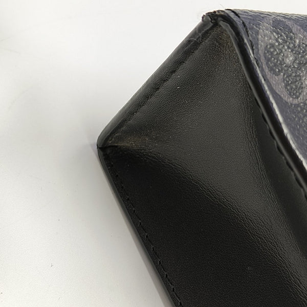 Pochette Voyag MM Monogram Coated Canvas Black